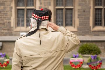 a veteran soldier salutes at last year's remembrance day ceremony at Hart House
