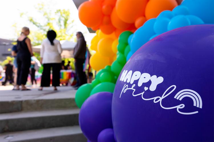 balloons that say "happy pride"