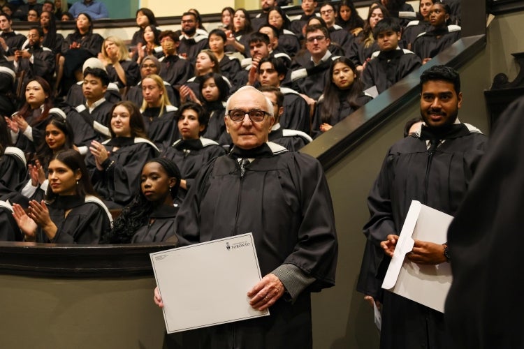 Jacques Leduc with his diploma