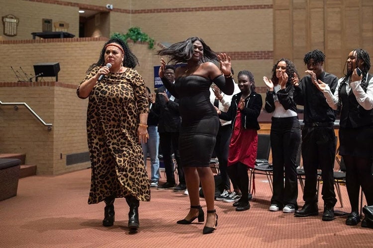 Abby-Gayle Isadora Allen dances beside Juno Award-winning singer Liberty Silver during the SEE UTM celebration and graduation