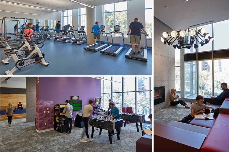 views of a common area with fireplace, games room and a gym with fitness equipment