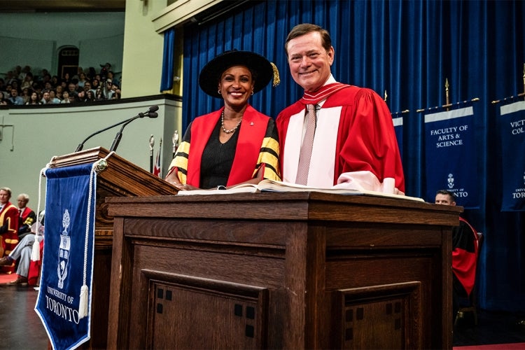 Blake Goldring with Rhonda McEwen after signing the honorary degree book